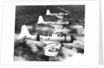 1940s three World War II US navy dive bombers flying in formation by Anonymous