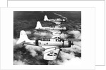 1940s three World War II US navy dive bombers flying in formation by Anonymous
