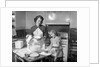 1950s mother and daughter baking a cake by Anonymous