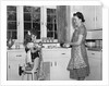 1930s 1940s mother and daughter washing dishes by Anonymous