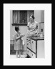 1920s young girl helping her mother to cook by Anonymous
