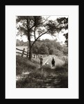 1930s boy and girl in straw hats walking down farm road by Anonymous