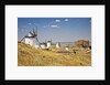 Antique La Mancha windmills and castle in Consuegra, Spain by Anonymous