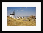 Antique La Mancha windmills and castle in Consuegra, Spain by Anonymous