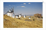 Antique La Mancha windmills and castle in Consuegra, Spain by Anonymous