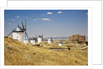 Antique La Mancha windmills and castle in Consuegra, Spain by Anonymous