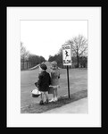 1930s 1940s boy and girl waiting to cross the road by Anonymous