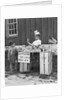 1940s boy running lemonade stand by Anonymous