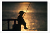 Silhouette of child fishing off a dock at sunset by Anonymous