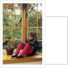 Little girl reading at home by Anonymous