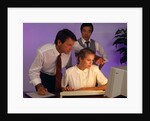 Business people working together at desktop computer by Anonymous