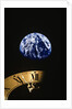 Earth and clock face at 11:57 by Anonymous