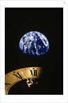 Earth and clock face at 11:57 by Anonymous