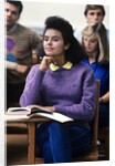 1980s college classroom students sitting at desks by Anonymous
