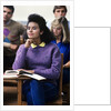 1980s college classroom students sitting at desks by Anonymous