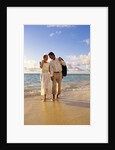 1980s 1990s couple walking on beach by Anonymous