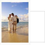 1980s 1990s couple walking on beach by Anonymous