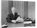 1930s senior executive speaking into a dictaphone by Anonymous