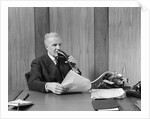 1930s senior executive speaking into a dictaphone by Anonymous