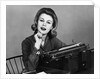 1960s smiling secretary with a typewriter by Anonymous