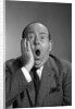 1960s balding man with a shocked expression by Anonymous