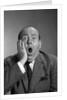 1960s balding man with a shocked expression by Anonymous