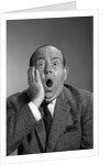 1960s balding man with a shocked expression by Anonymous