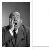 1960s balding man with a shocked expression by Anonymous