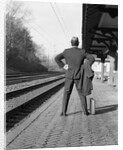 1950s 1960s man waiting for a train by Anonymous