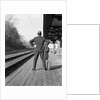 1950s 1960s man waiting for a train by Anonymous