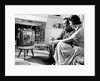 1950s couple watching television by Anonymous