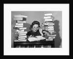 1950s portrait of woman sitting with stacks of books by Anonymous