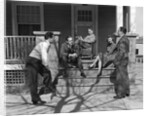 1930s three men courting a woman on a front porch by Anonymous