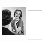 1960s two women talking by Anonymous