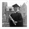 1950s smiling female graduate holding a diploma by Anonymous