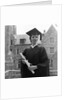 1950s smiling female graduate holding a diploma by Anonymous