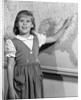 1960s school girl pointing to map of the USA by Anonymous