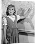 1960s school girl pointing to map of the USA by Anonymous