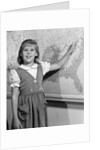 1960s school girl pointing to map of the USA by Anonymous