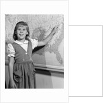 1960s school girl pointing to map of the USA by Anonymous
