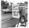 1970s gas pump with temporarily closed sign by Anonymous