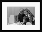1980s boys and girl playing games on a computer by Anonymous