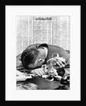 1930s man with head on his desk holding stock ticker tape by Anonymous