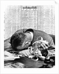 1930s man with head on his desk holding stock ticker tape by Anonymous
