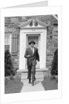 1950s smiling businessman walking out the front door of his house by Anonymous