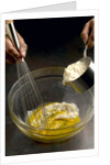 Adding hot rice to egg yolks by Anonymous