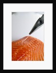 Deboning a salmon fillet by Anonymous