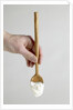Spoon with yogurt by Anonymous