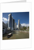 Boat on the Singapore river, the Cavenagh Bridge and the downtown by Anonymous