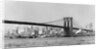 The Brooklyn Bridge spans the East River, ca. 1910. by Anonymous
